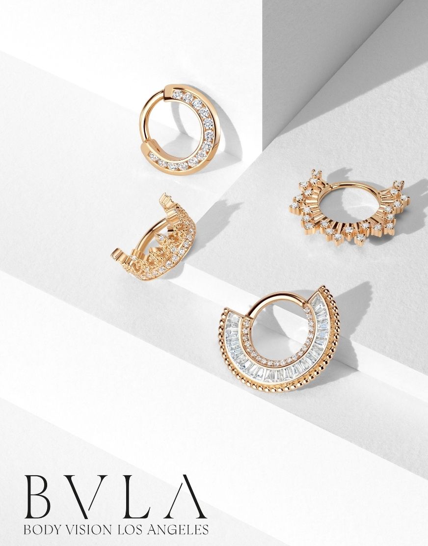 Gold and crystal earrings on a white background with 'BVLA' branding.