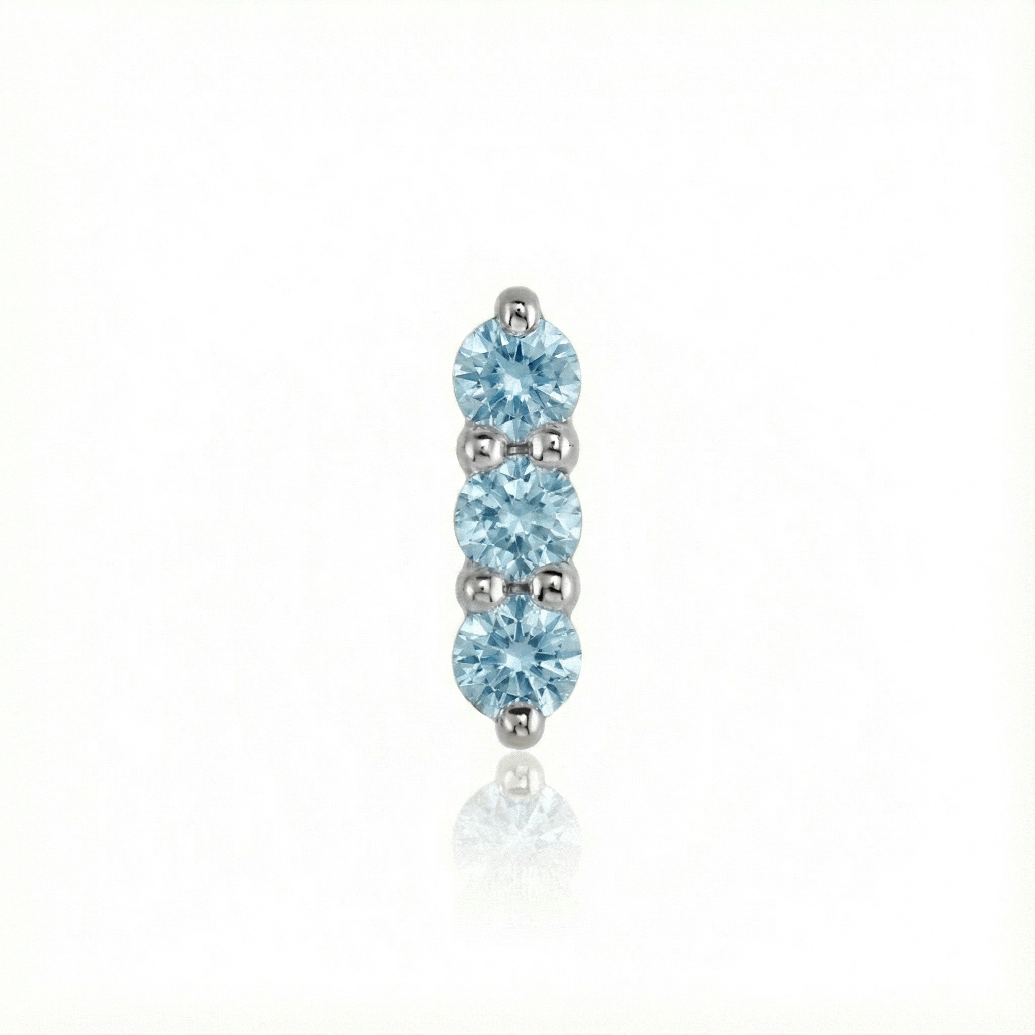 Blue gemstone earring on a white background