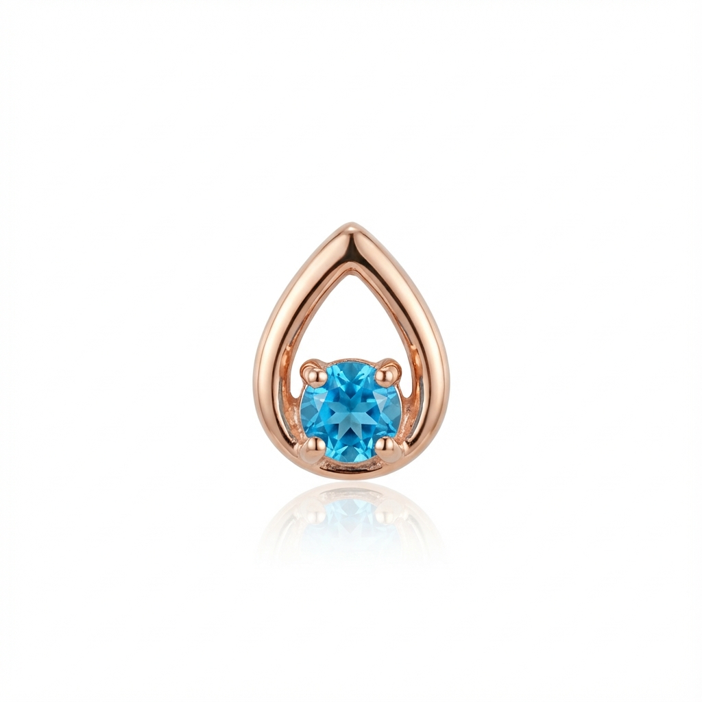 Rose gold teardrop-shaped earring with a blue gemstone on a white background
