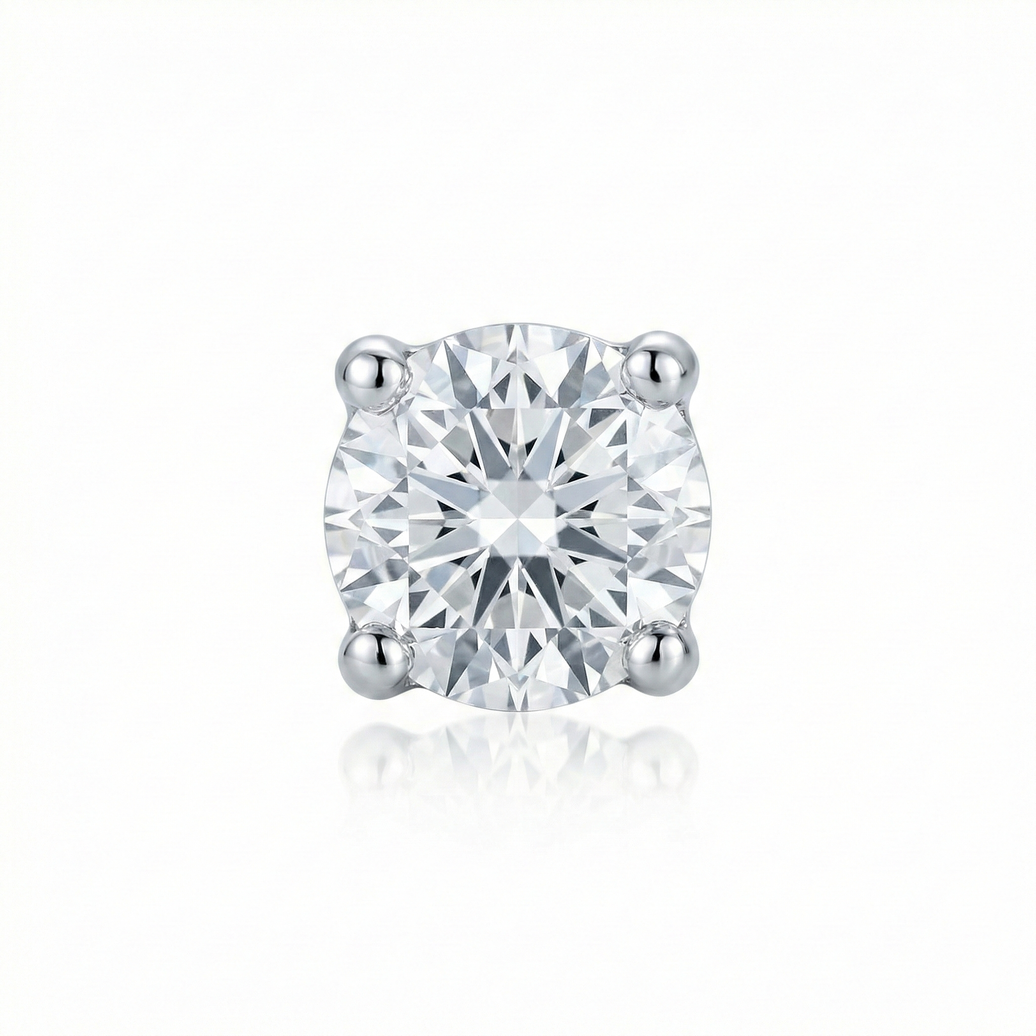 Single diamond earring on a white background