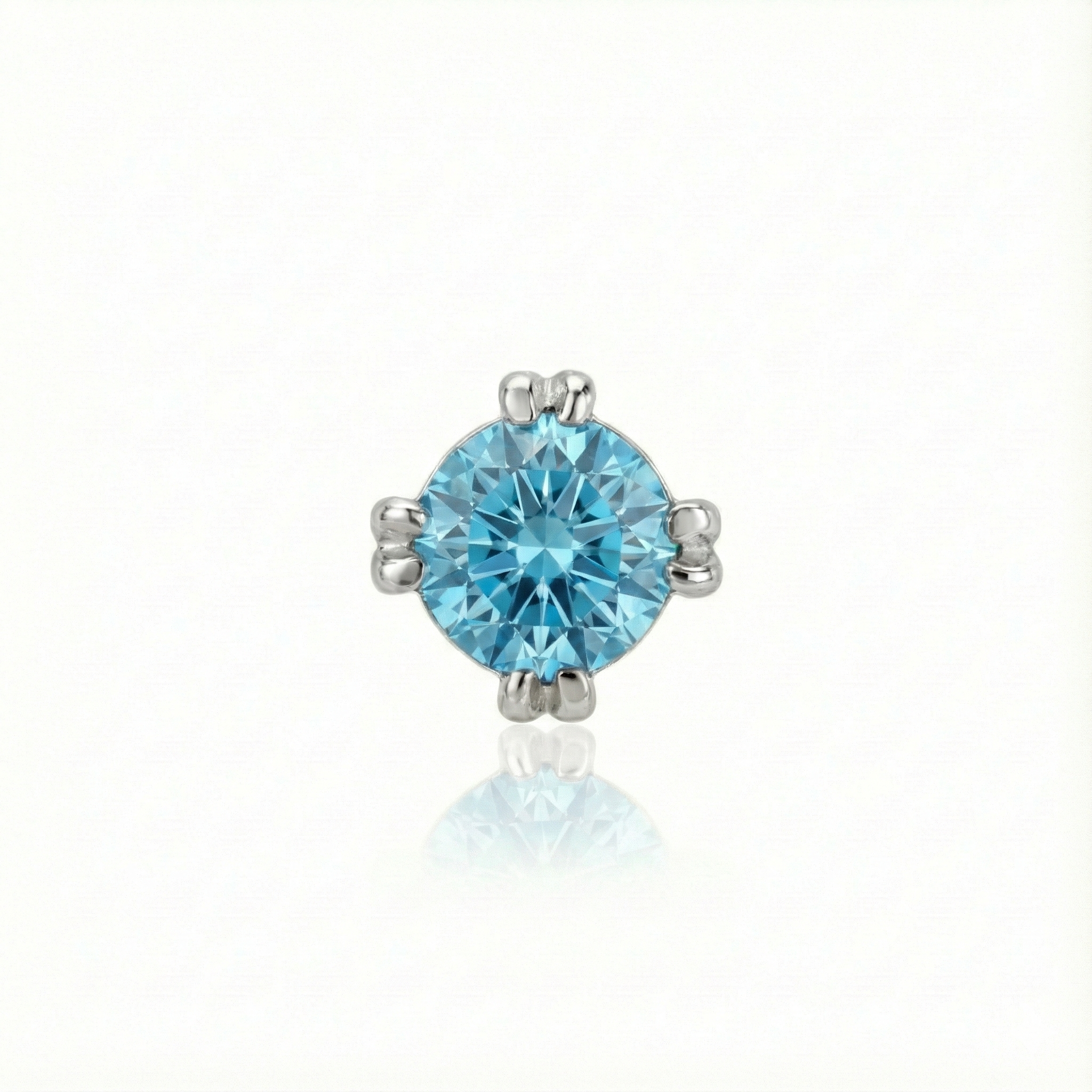 Blue gemstone earring on a white background