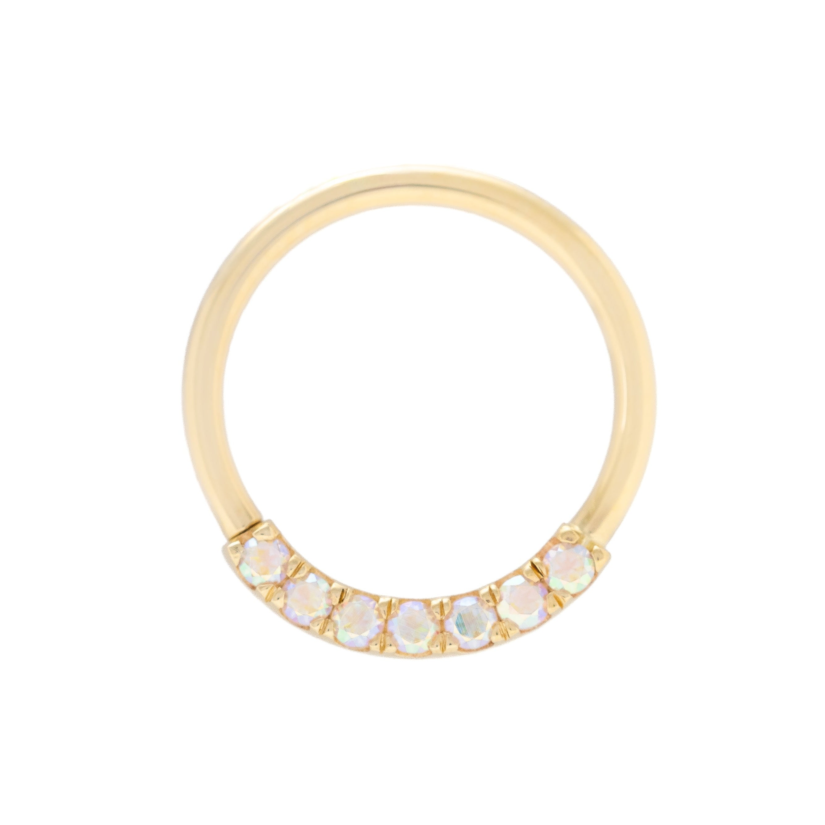 Gold ring with small stones on a white background