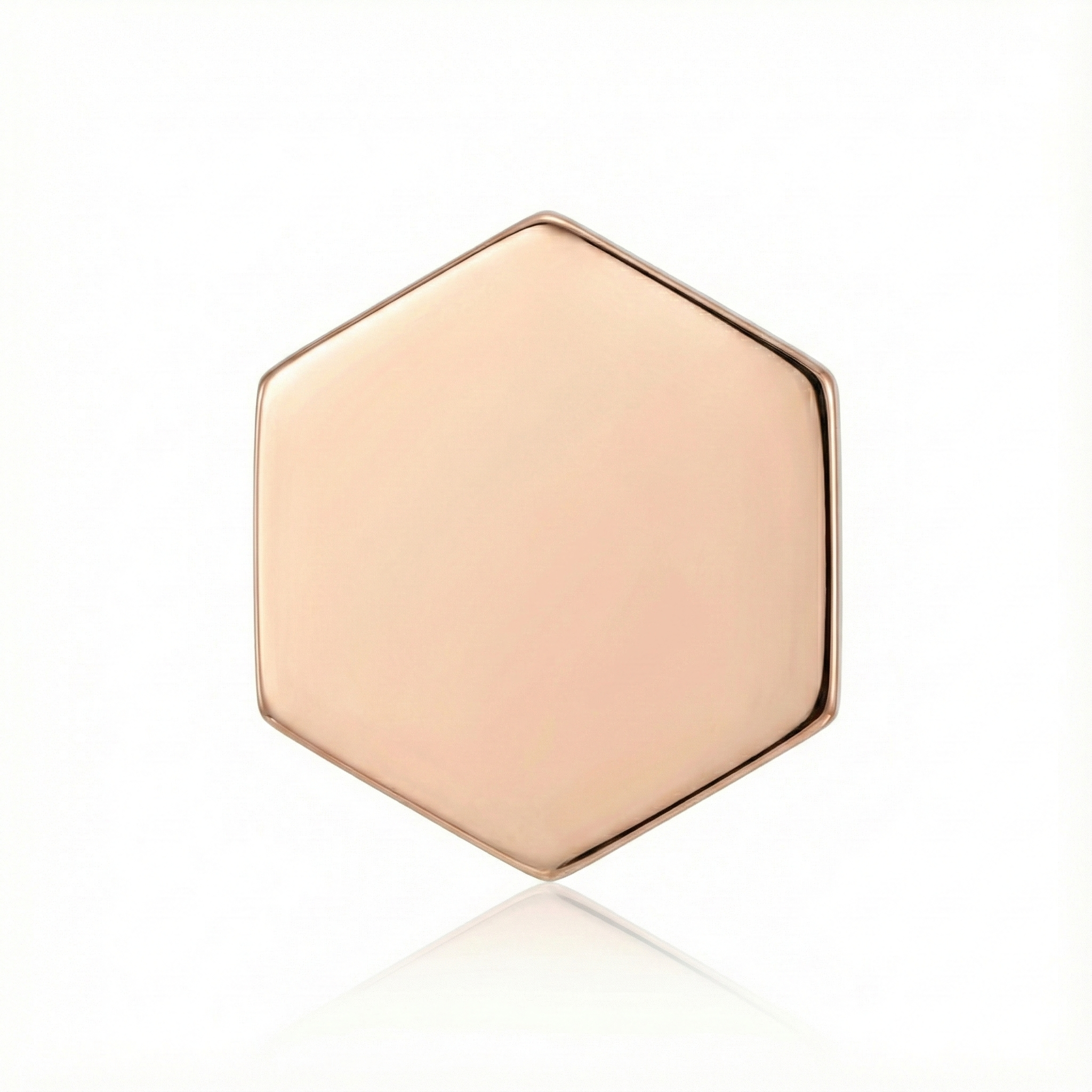 Rose gold hexagonal earring on a white background