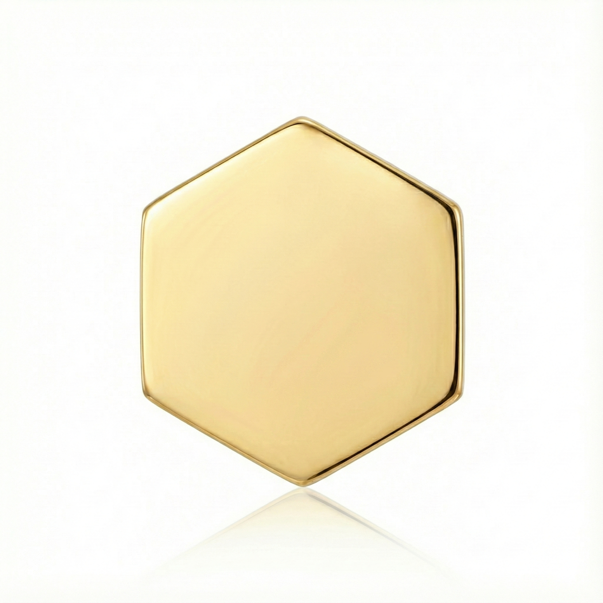 Gold hexagonal earring on a white background