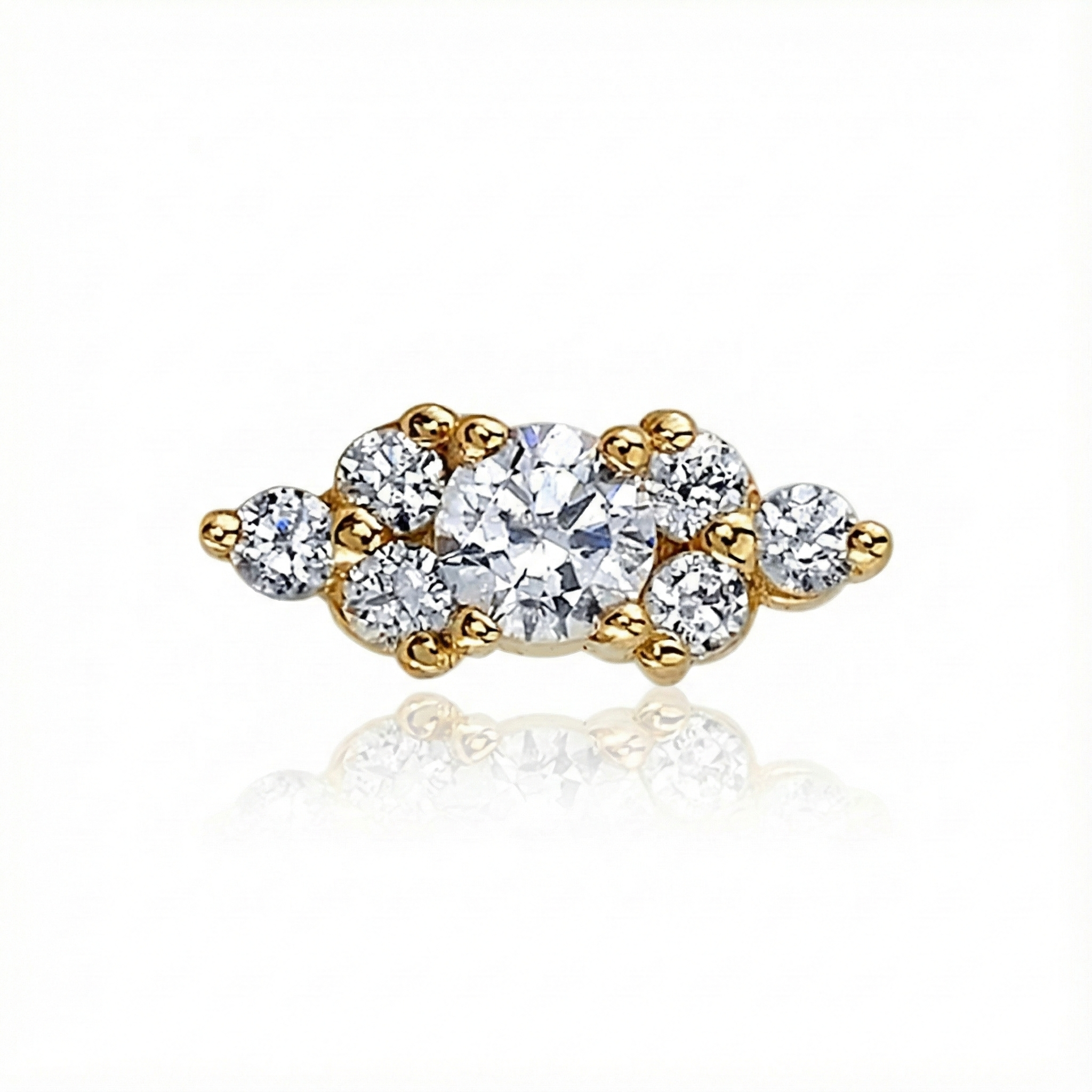 Gold and diamond earring on a white background