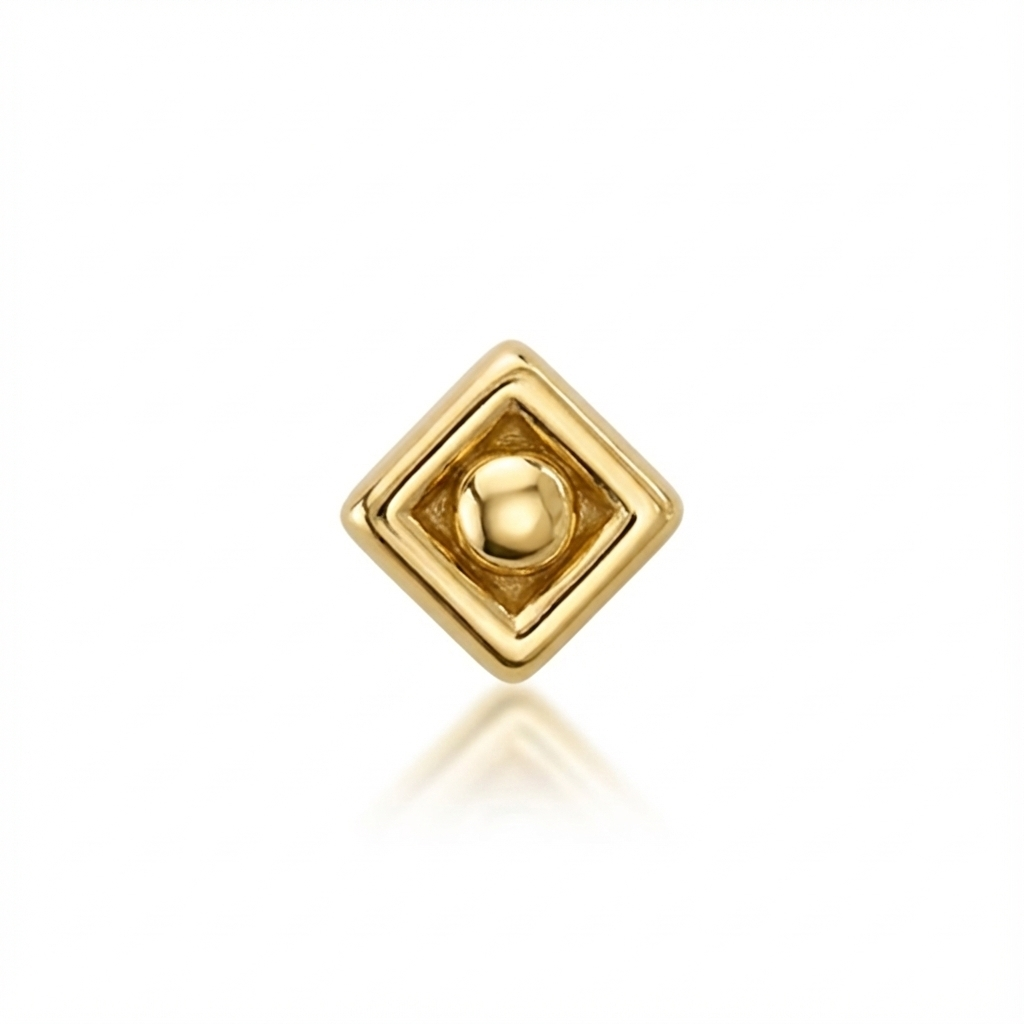 Gold square-shaped earring on a white background