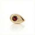 Gold end with a red gemstone on a white background
