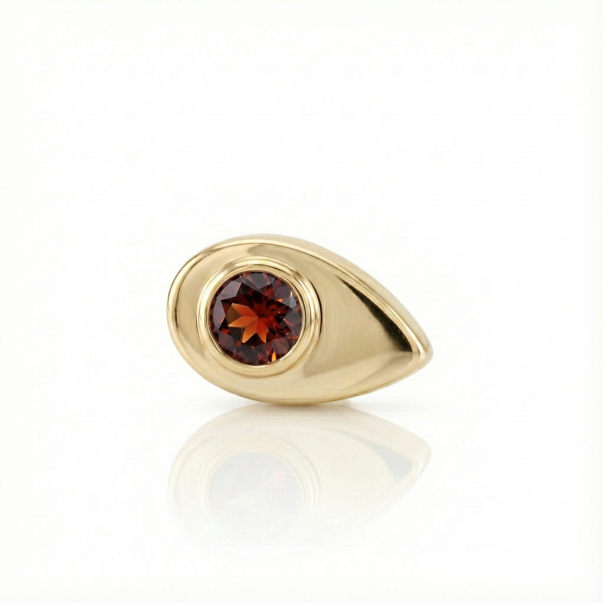 Gold end with a red gemstone on a white background